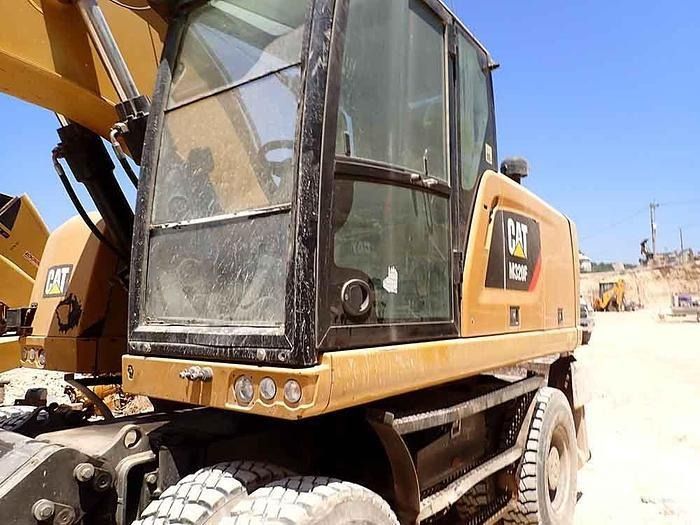 2016 Caterpillar M320F wheel excavator cab view