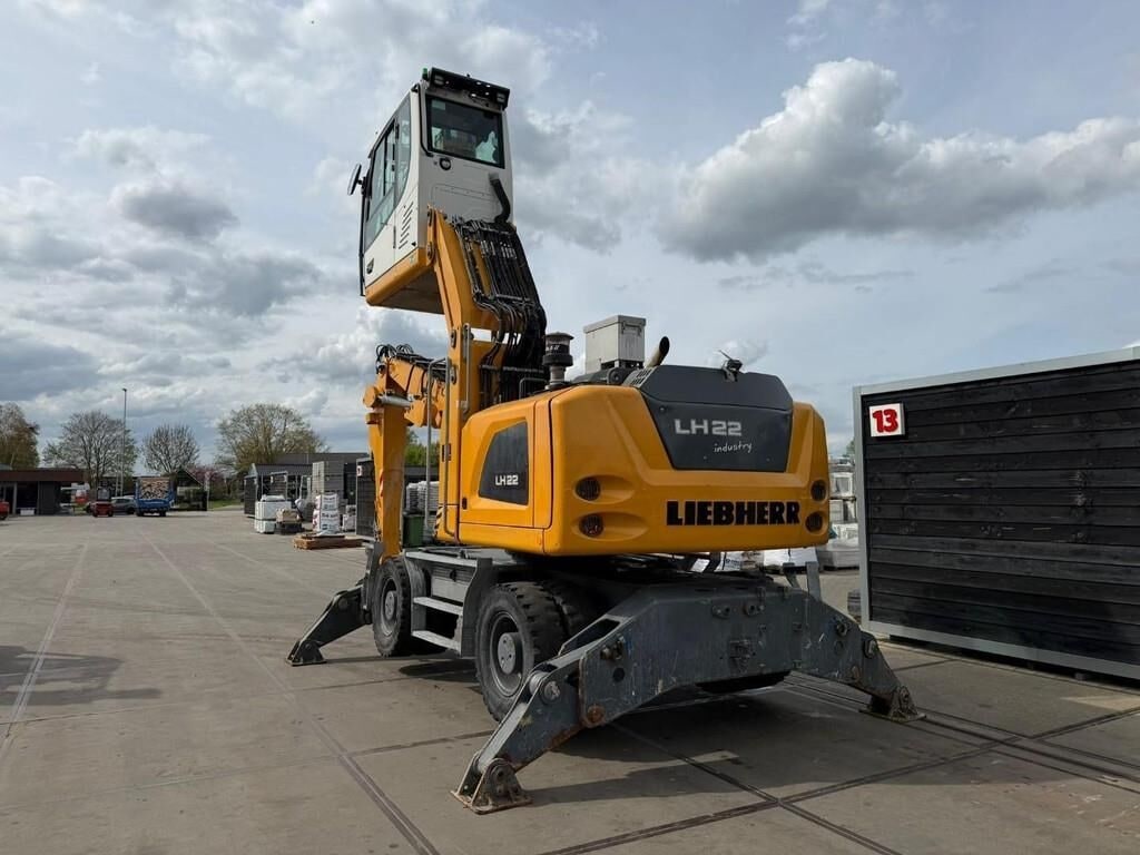 2018 Liebherr LH22 M material handler, rear three-quarter view