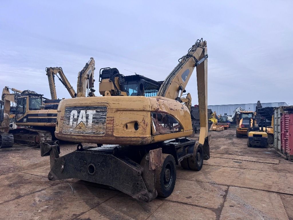 2012 Caterpillar M322D MH material handler rear view