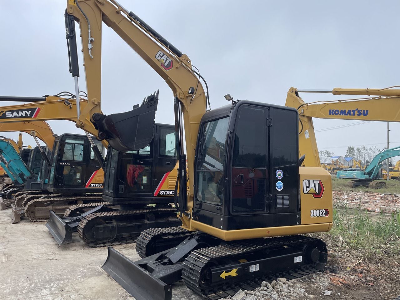 2023 Caterpillar 306E2 mini excavator, side view