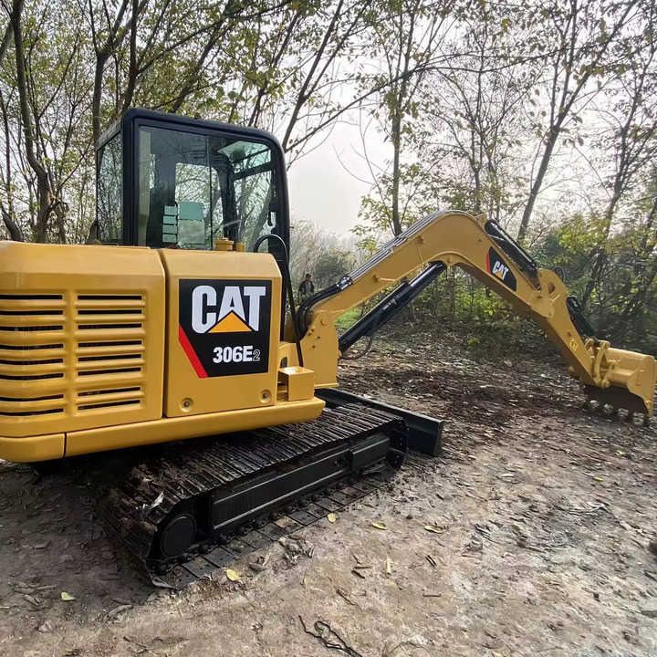 2022 Caterpillar 306E2 mini excavator, rear three-quarter view