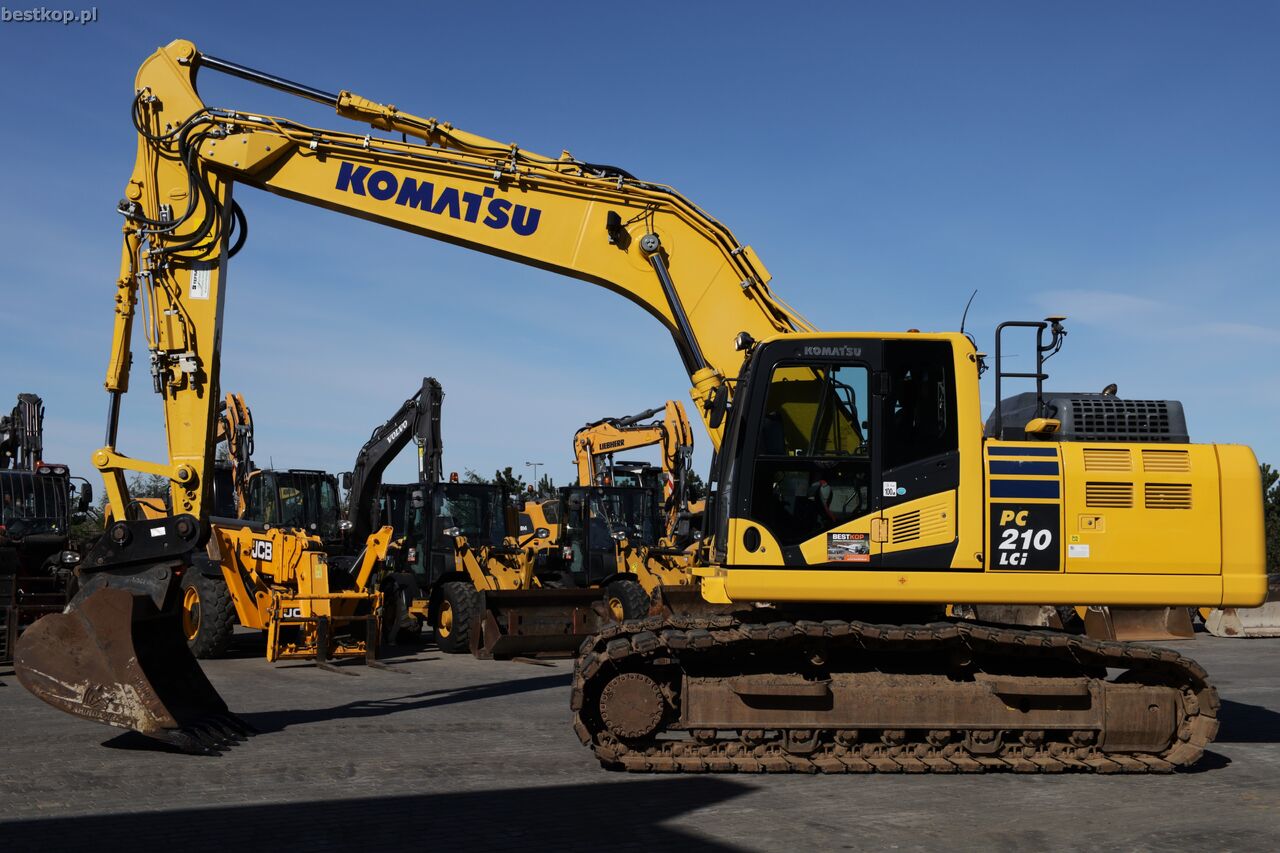 2019 Komatsu PC210LC-11 crawler excavator, side profile view