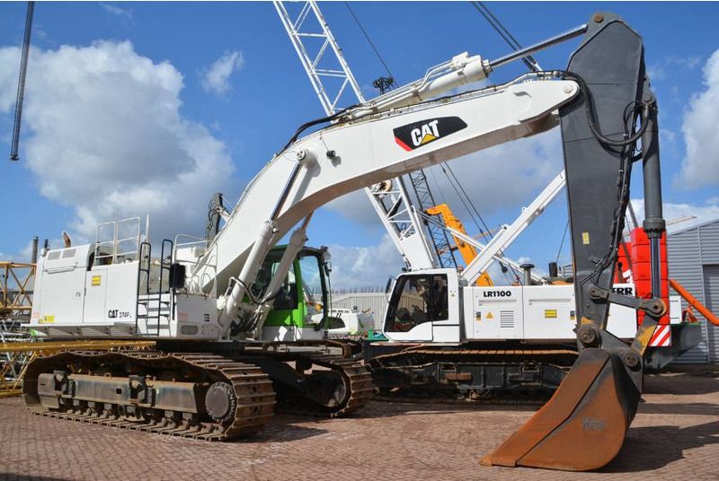 2014 Caterpillar 374FL crawler excavator, side profile view