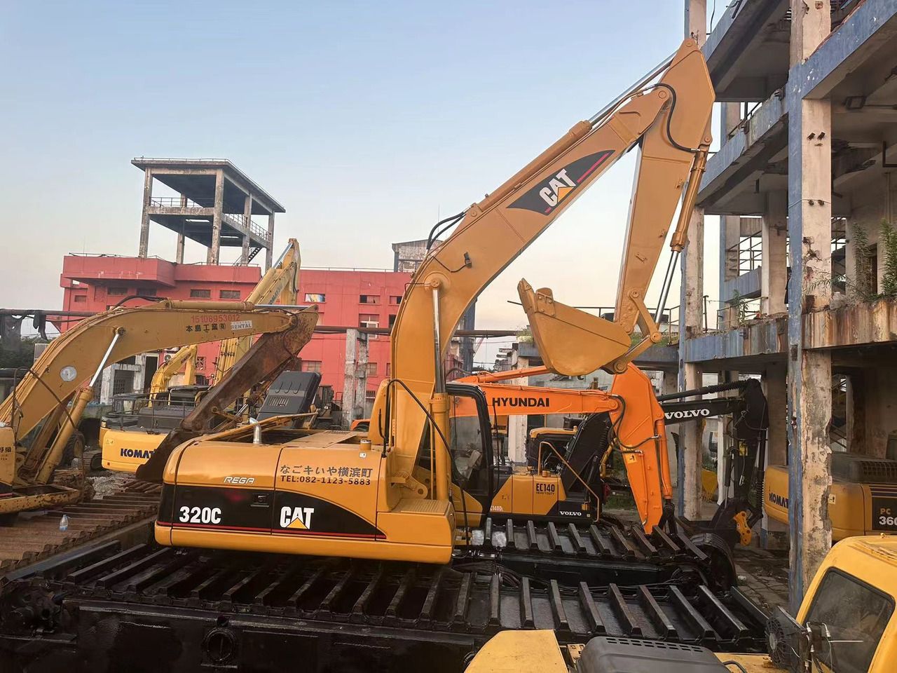 2018 Caterpillar 320C amphibious excavator, side view