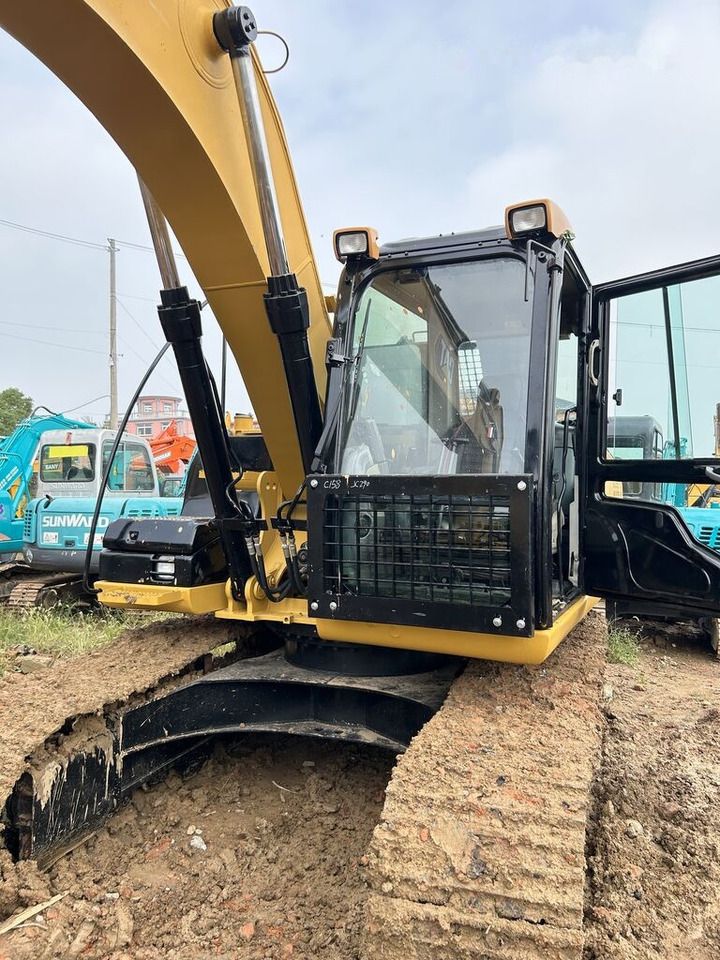 Caterpillar 315D2GC crawler excavator cab and boom view