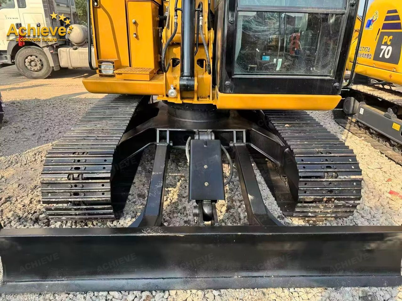 2025 Caterpillar 307C mini excavator front view with blade