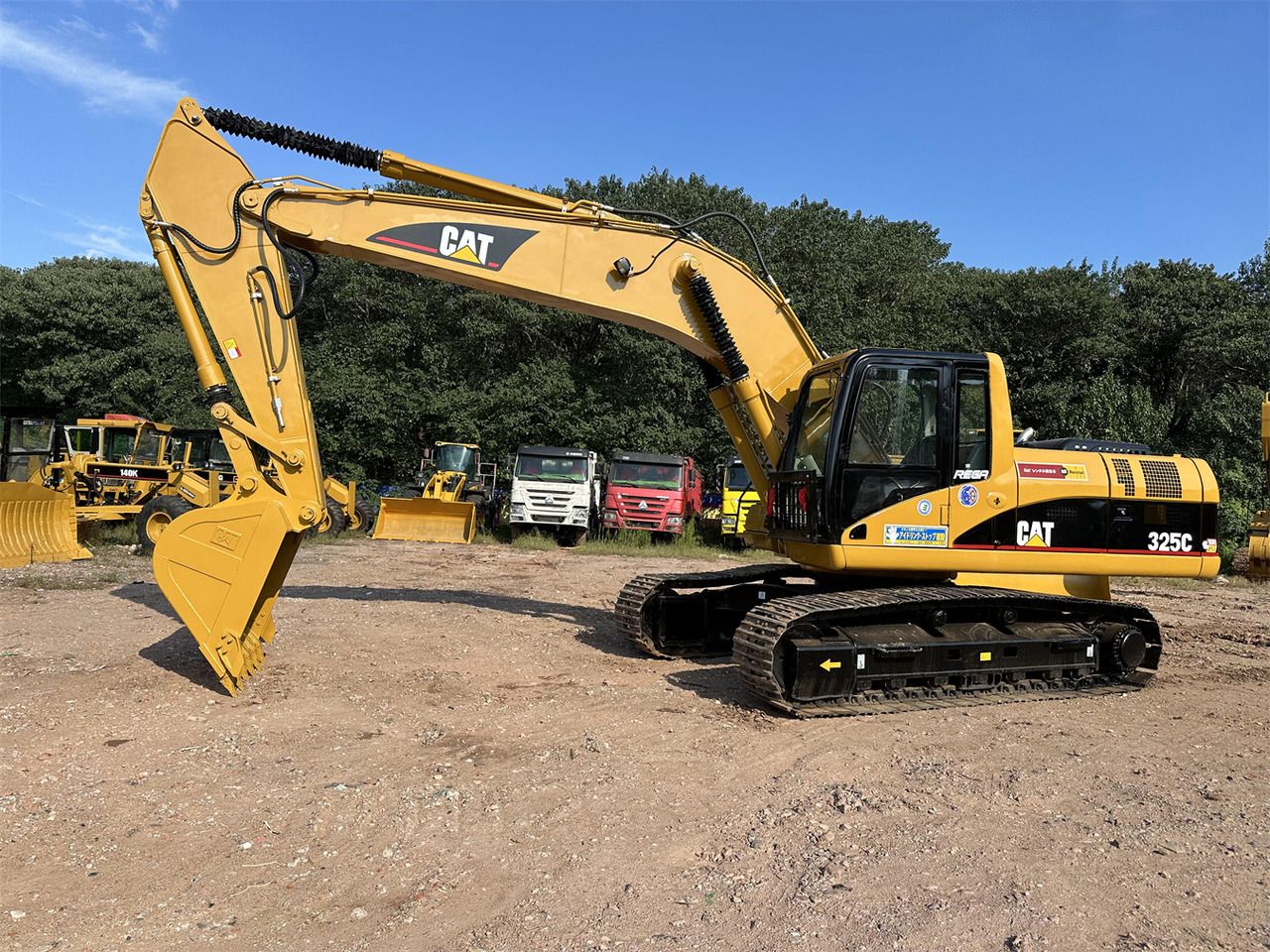 2018 Caterpillar 325C crawler excavator, side profile view
