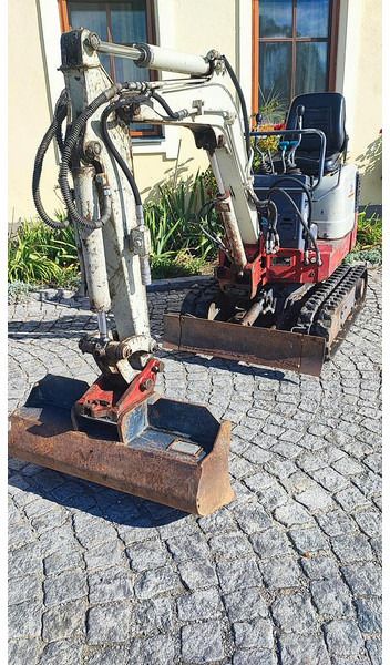 2009 Takeuchi TB108 mini excavator, front three-quarter view