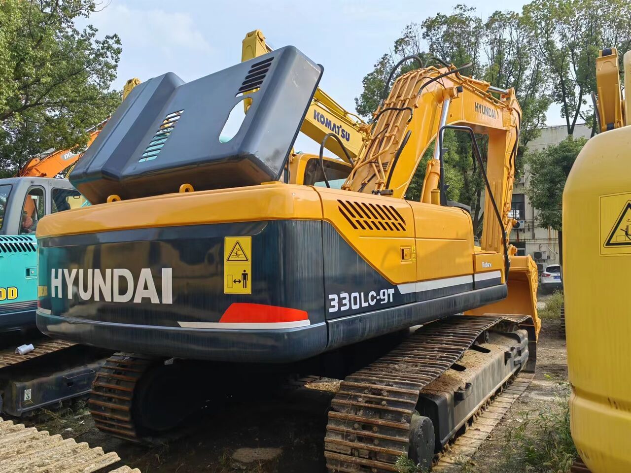 2023 Hyundai R330LC-9T excavator, rear three-quarter view