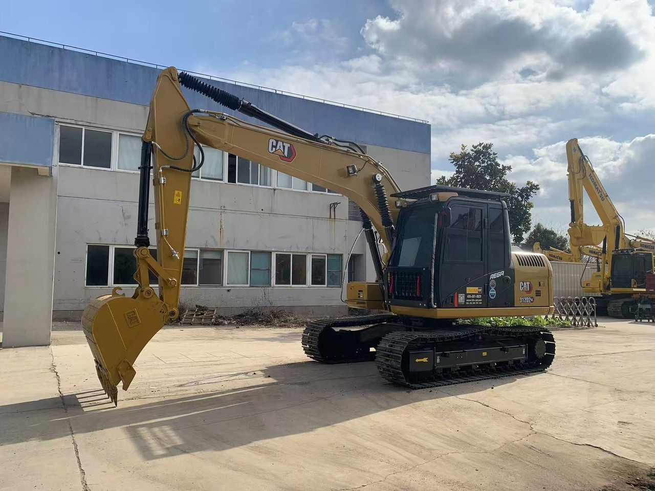 2023 Caterpillar 312D2 crawler excavator, side view