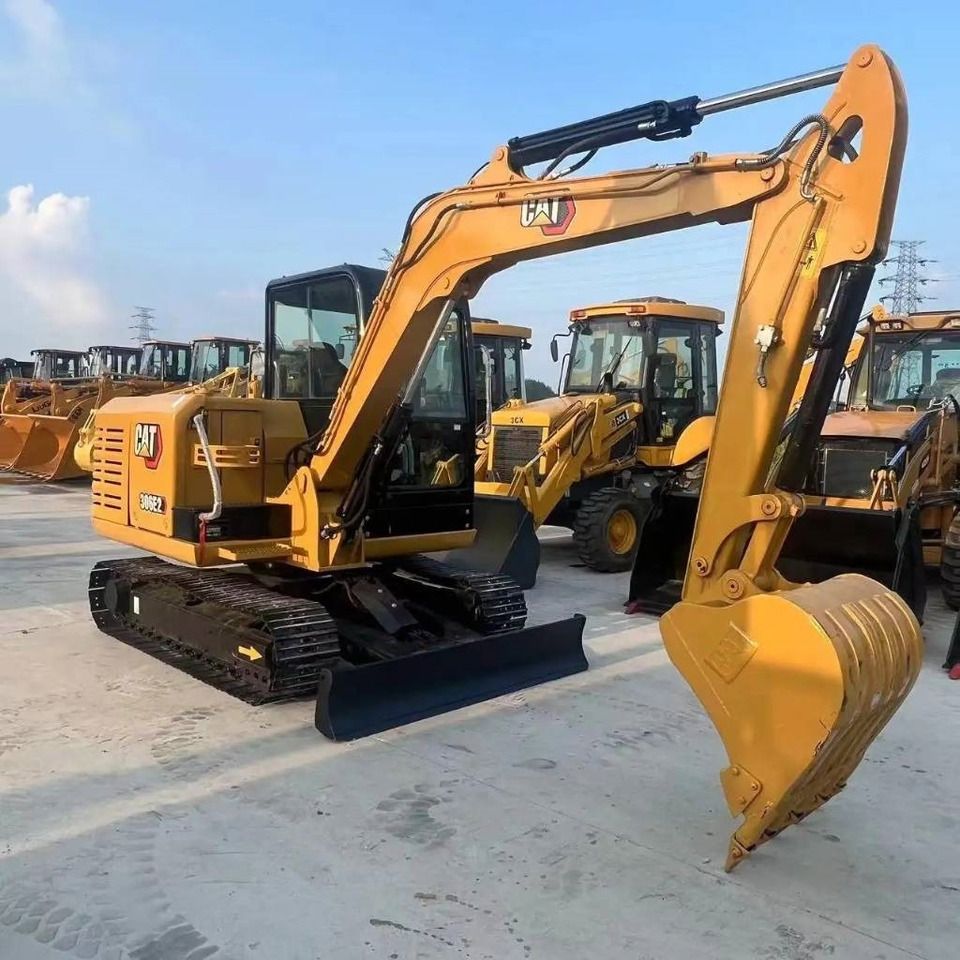 2023 Caterpillar 306E2 mini excavator, three-quarter view