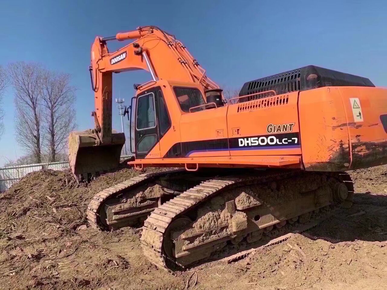 2022 Doosan DH500LC-7 excavator, rear three-quarter view 2022 Doosan DH500LC-7 excavator, rear three-quarter view
