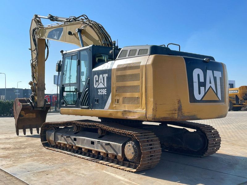 2011 Caterpillar 329ELN crawler excavator, rear three-quarter view