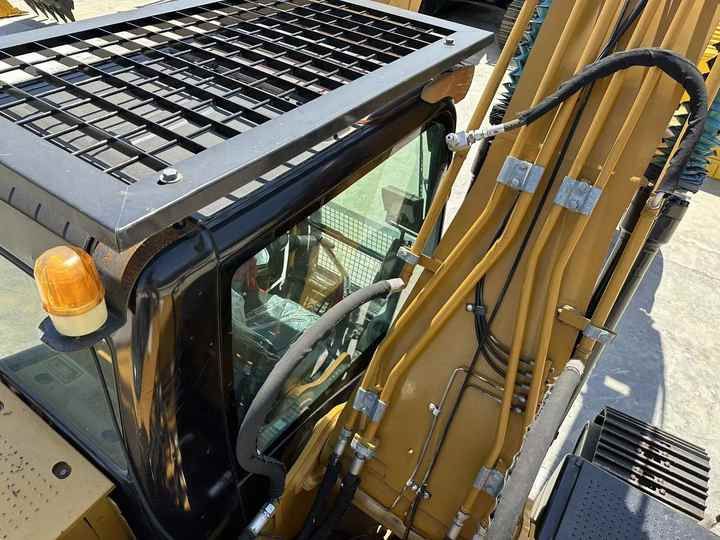 2021 Caterpillar 320E crawler excavator cab and boom detail