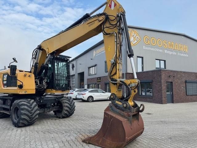 2020 Caterpillar M320F wheel excavator, front three-quarter view