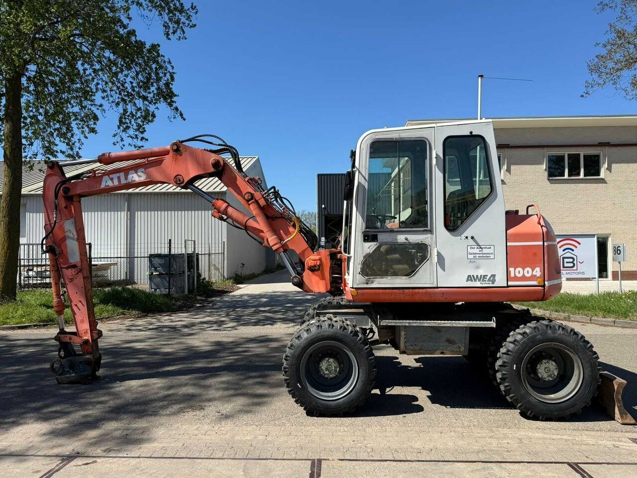 2001 Atlas 1004 M wheel excavator side view