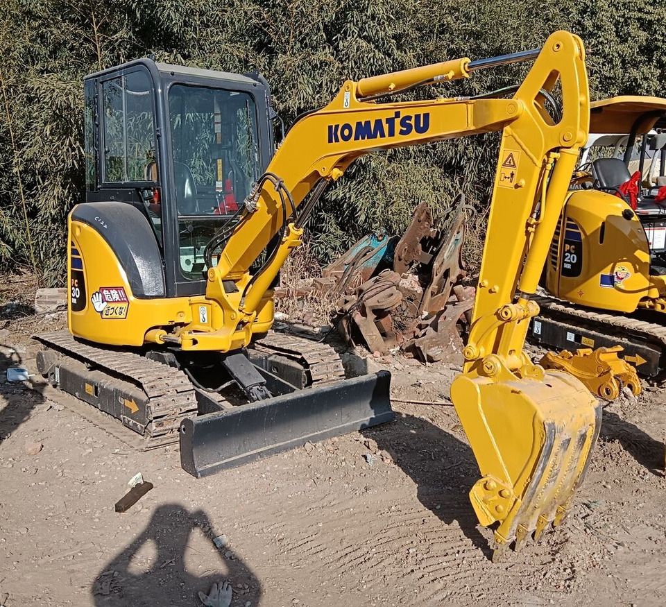 Komatsu PC30MR mini excavator, side view