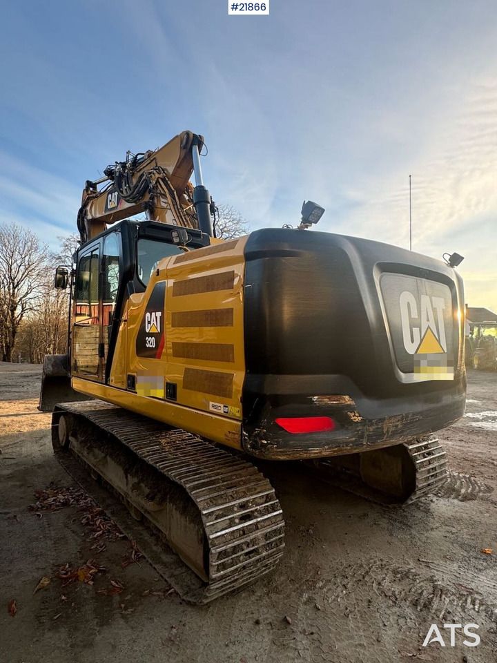 2019 Caterpillar 320 crawler excavator, rear three-quarter view