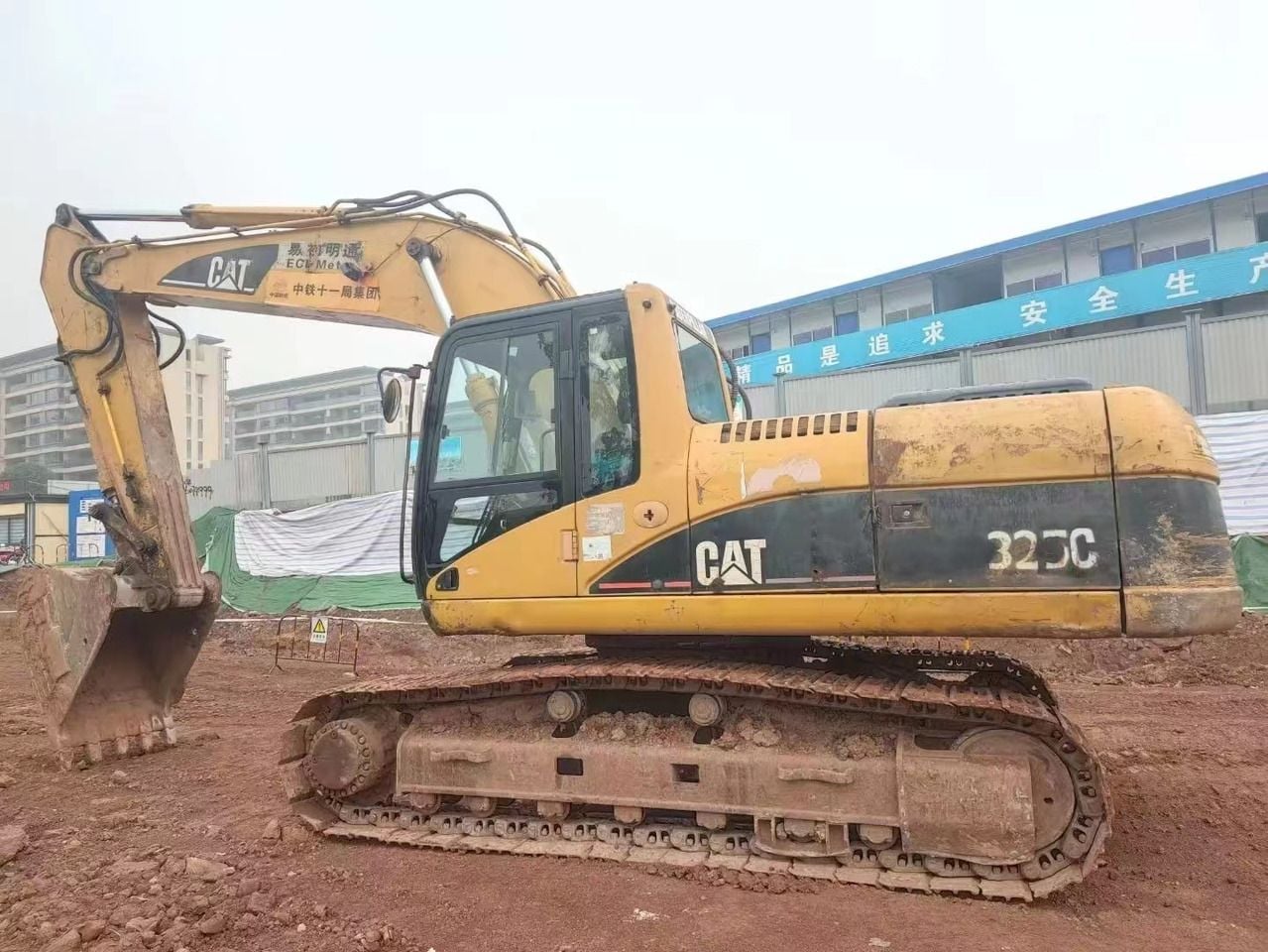2022 Caterpillar 325C crawler excavator, side view