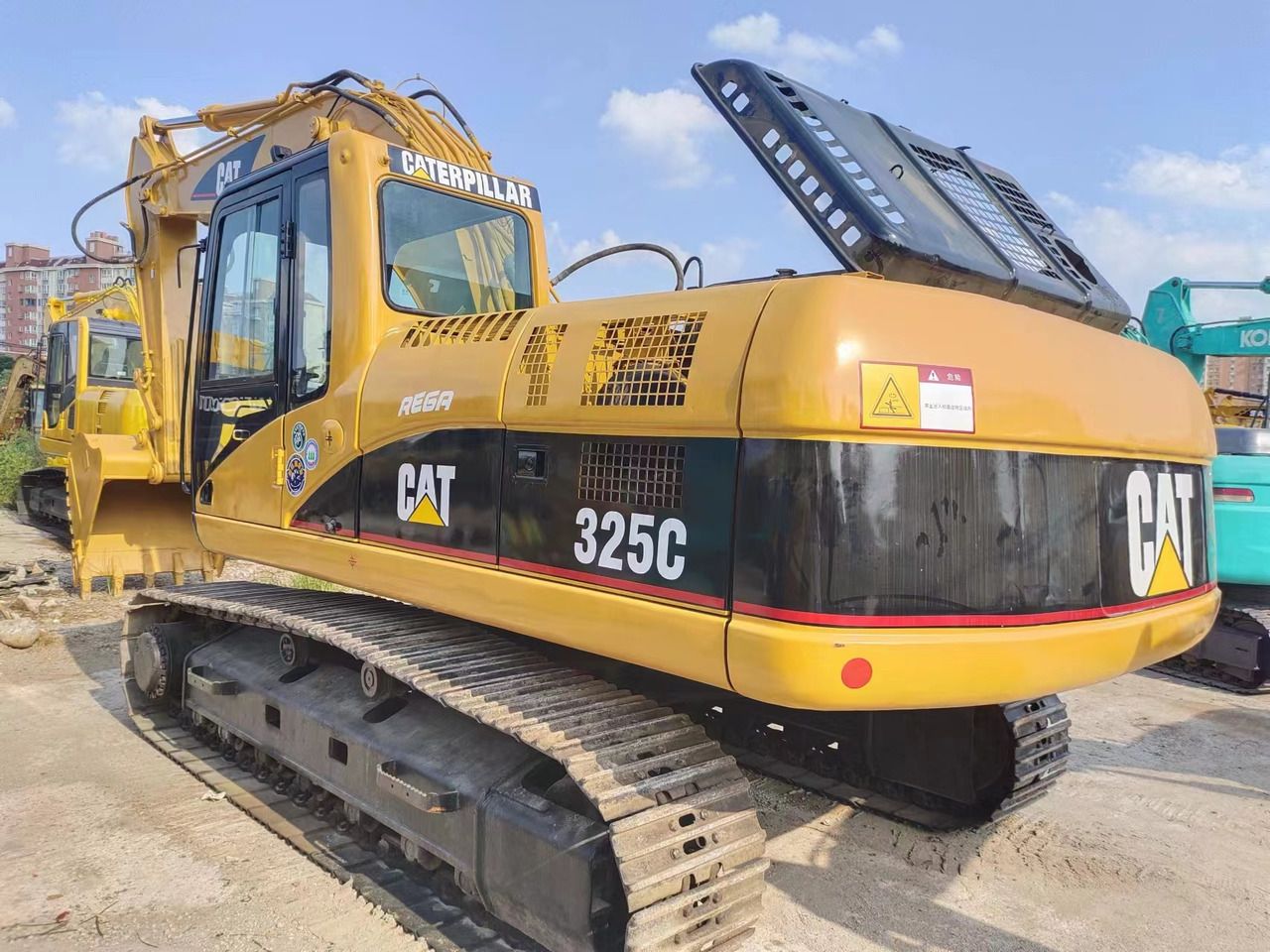 2018 Caterpillar 325C crawler excavator, rear three-quarter view
