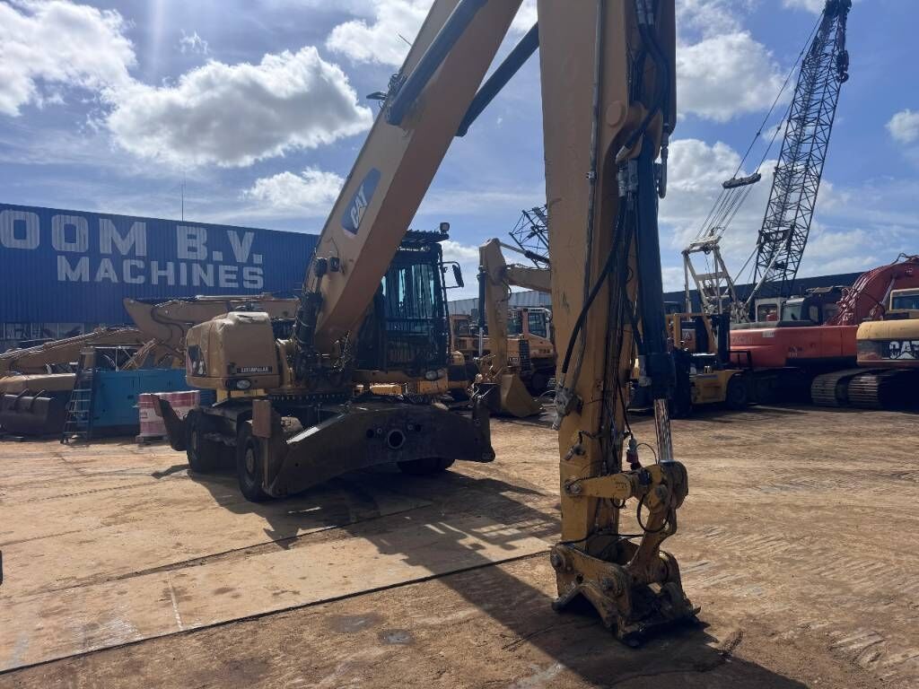 2011 Caterpillar M322D MH material handler, side view