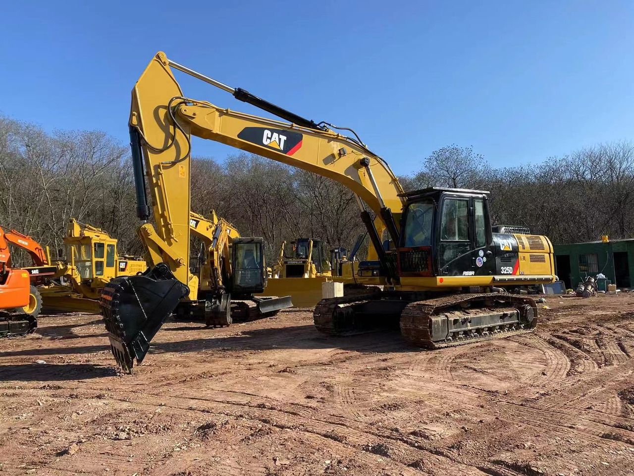 2019 Caterpillar 325D crawler excavator, side profile view