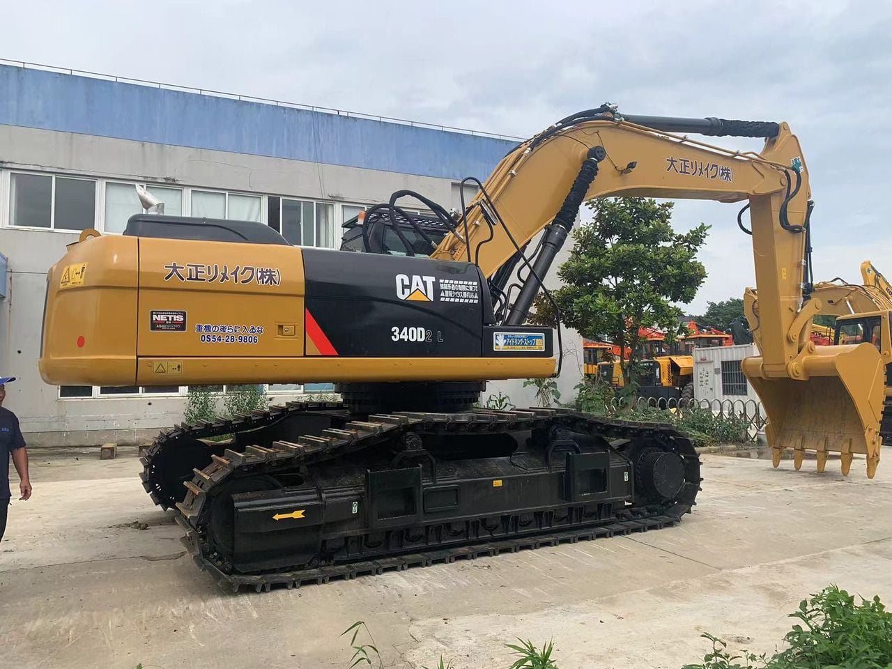 2022 Caterpillar 340D2 L crawler excavator, side profile view
