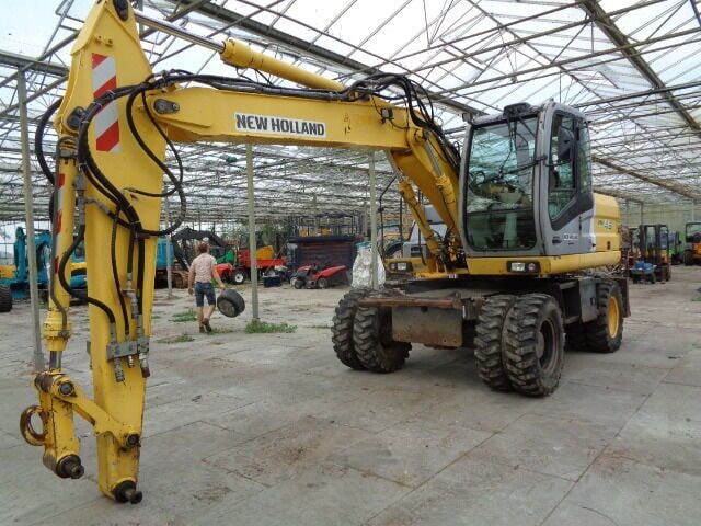 2005 New Holland MH 4.6 Wheel Excavator 2005 New Holland MH 4.6 Wheel Excavator