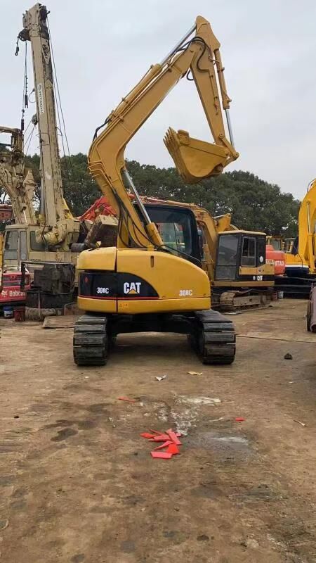 2010 Caterpillar 308C mini excavator, front three-quarter view