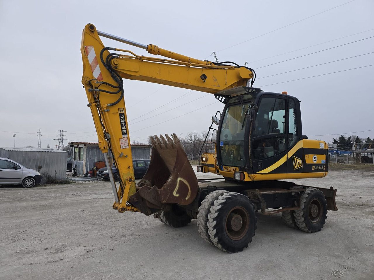 2007 JCB JS145W wheel excavator, side view 2007 JCB JS145W wheel excavator, side view