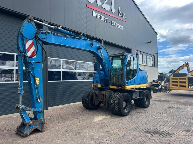 2007 New Holland MH Plus Wheel Excavator 2007 New Holland MH Plus Wheel Excavator