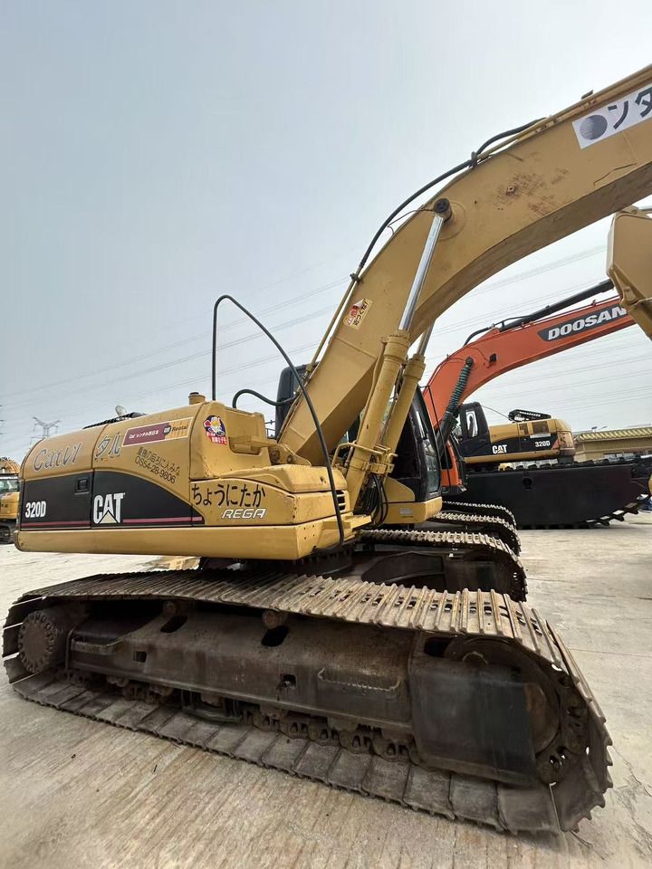 2008 Caterpillar 320D crawler excavator, side view 2008 Caterpillar 320D crawler excavator, side view