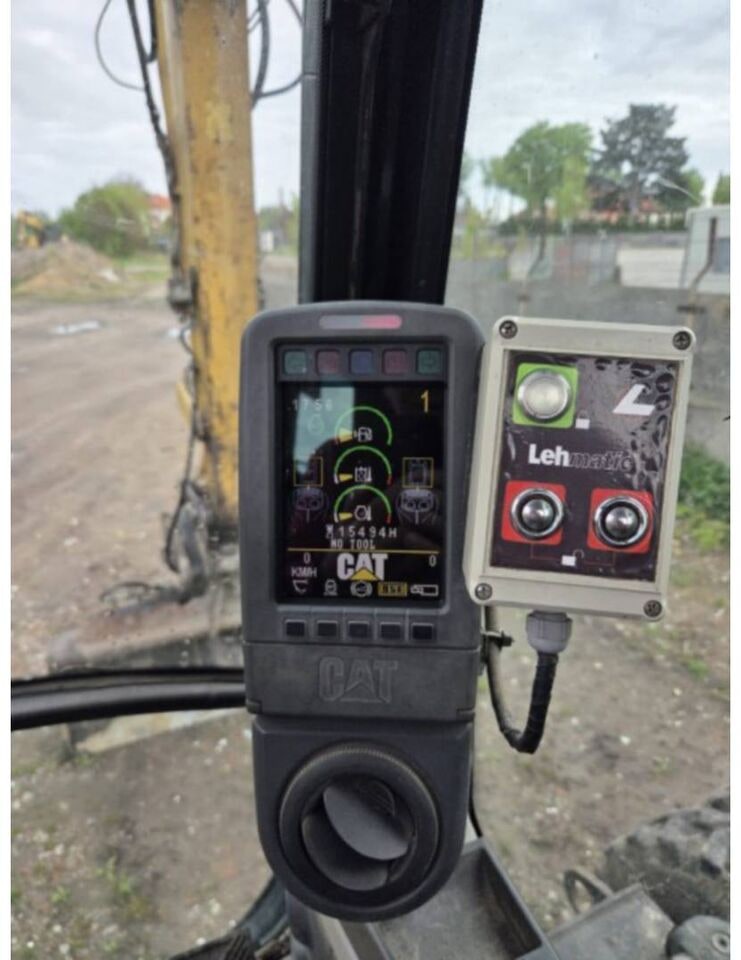 2010 Caterpillar M316D Wheel Excavator