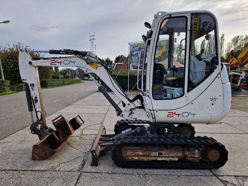 2011 Wacker Neuson 2404RD mini excavator, side view 2011 Wacker Neuson 2404RD mini excavator, side view