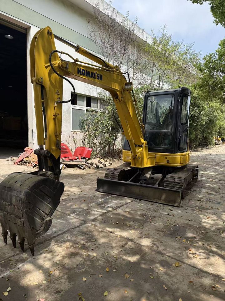 2012 Komatsu PC-55MR mini excavator, front three-quarter view 2012 Komatsu PC-55MR mini excavator, front three-quarter view