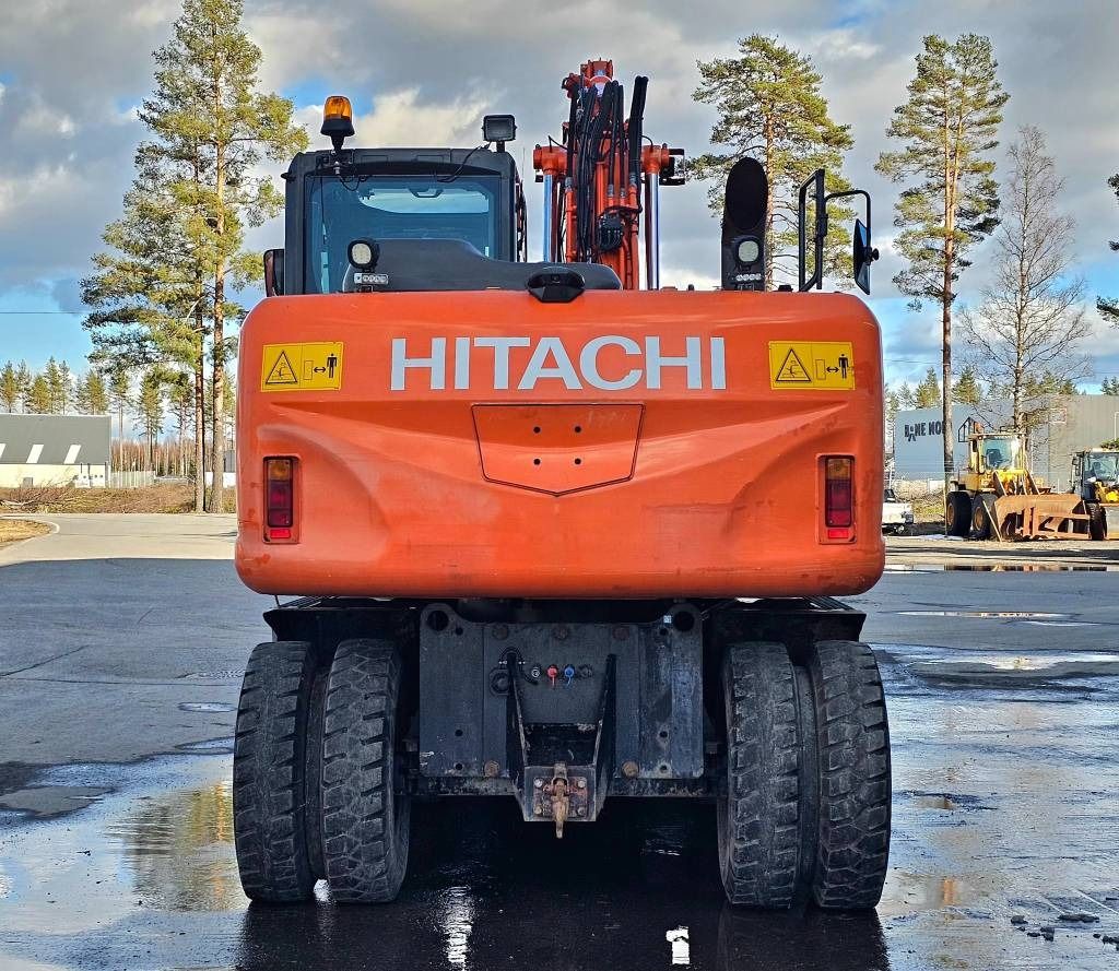 2015 Hitachi ZX140W-5 wheel excavator, rear view 2015 Hitachi ZX140W-5 wheel excavator, rear view