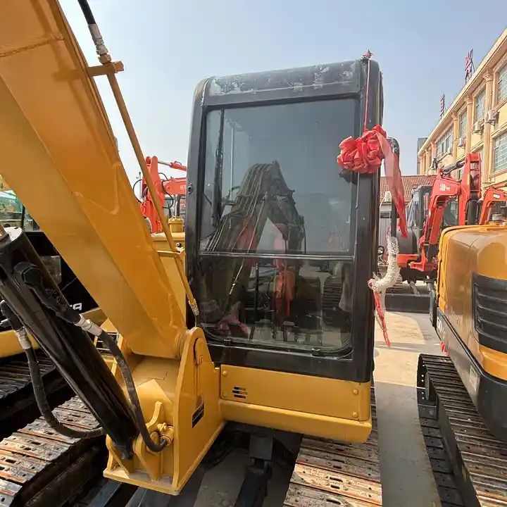 2016 Caterpillar 306D crawler excavator, side view of cab and boom 2016 Caterpillar 306D crawler excavator, side view of cab and boom