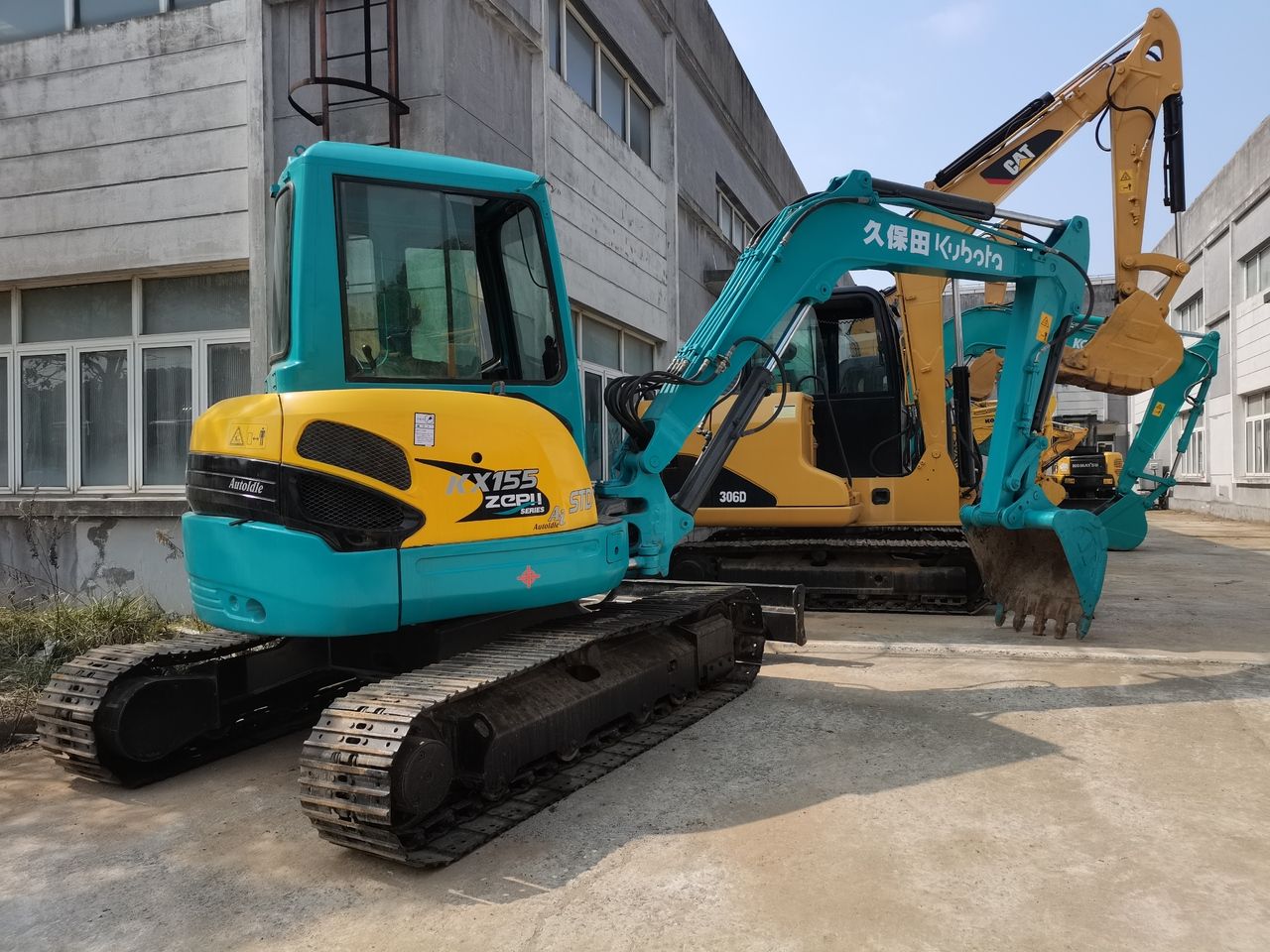 2016 Kubota KX155 mini excavator, rear three-quarter view 2016 Kubota KX155 mini excavator, rear three-quarter view