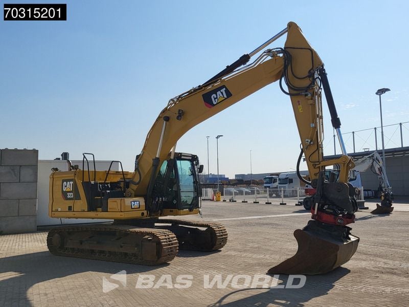 2019 Caterpillar 323 crawler excavator, rear three-quarter view 2019 Caterpillar 323 crawler excavator, rear three-quarter view