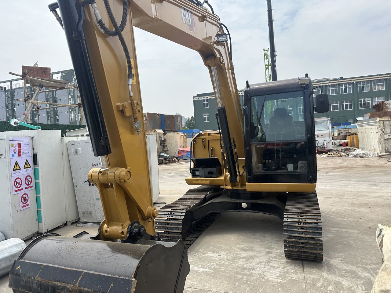 2021 Caterpillar 308E mini excavator, front three-quarter view 2021 Caterpillar 308E mini excavator, front three-quarter view