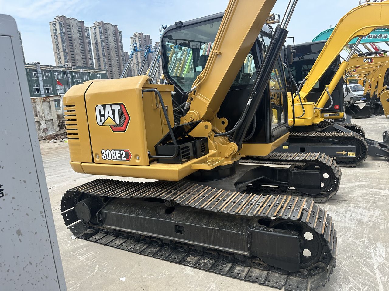 2021 Caterpillar 308E2 mini excavator side view 2021 Caterpillar 308E2 mini excavator side view
