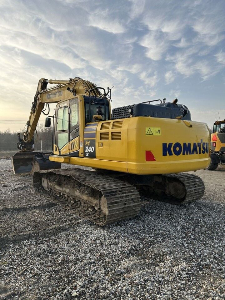 2021 Komatsu PC240LC-11 crawler excavator, rear three-quarter view 2021 Komatsu PC240LC-11 crawler excavator, rear three-quarter view