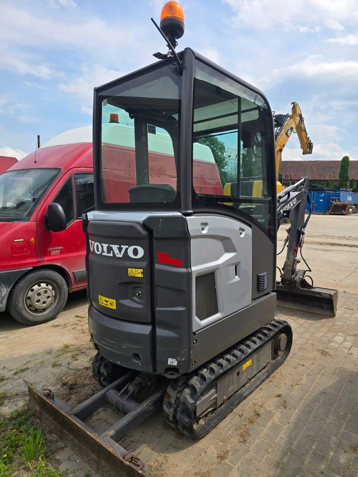 2021 Volvo EC18E mini excavator, rear three-quarter view