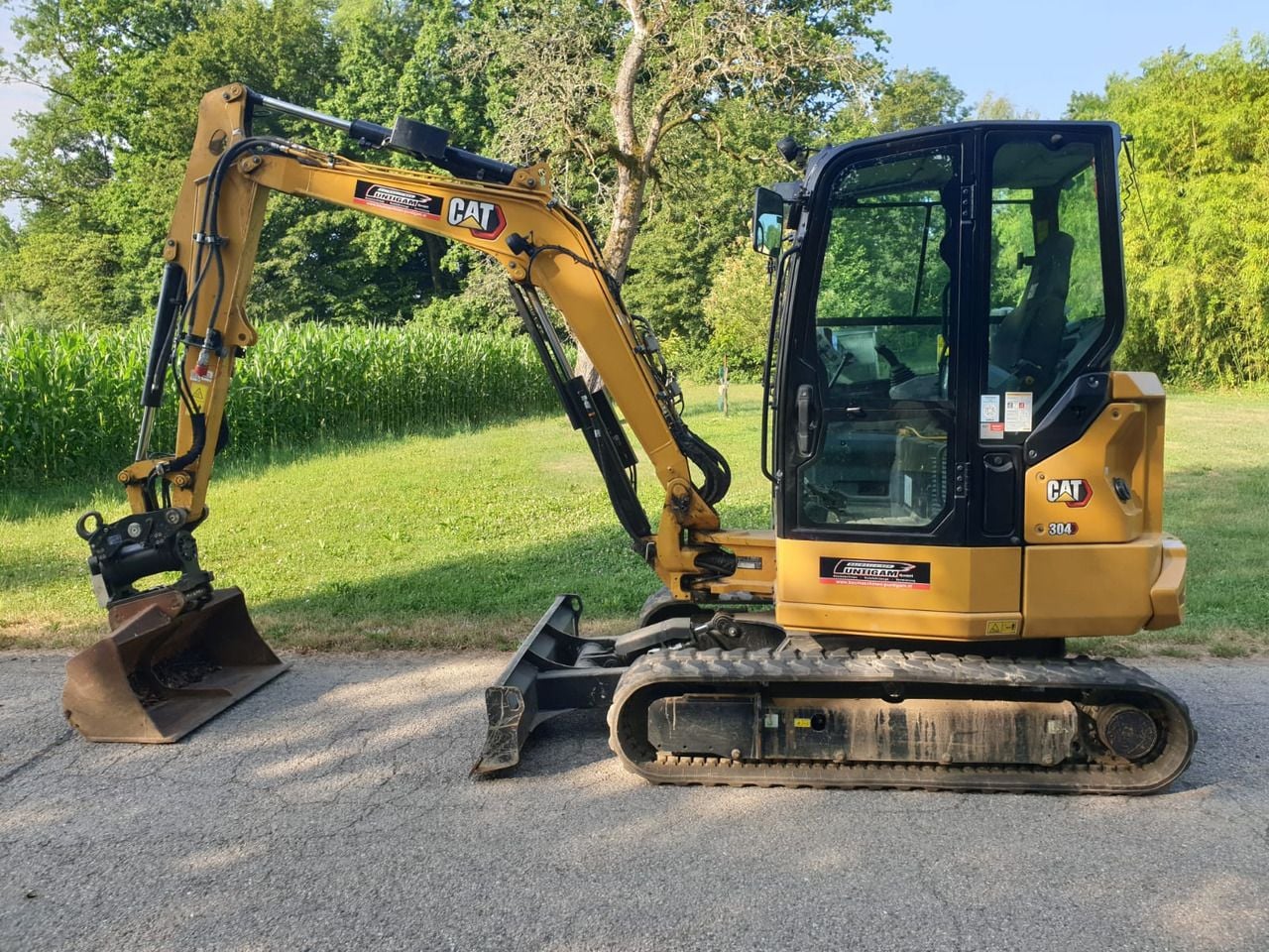 2022 Caterpillar 304-07 mini excavator, side view 2022 Caterpillar 304-07 mini excavator, side view