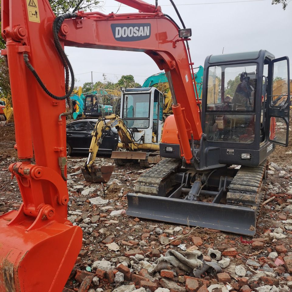 2022 Doosan DH55 mini excavator, front three-quarter view 2022 Doosan DH55 mini excavator, front three-quarter view