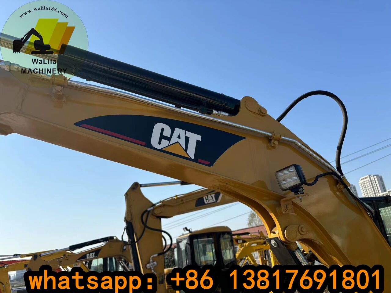 2023 Caterpillar 303CCR mini excavator, front three-quarter view