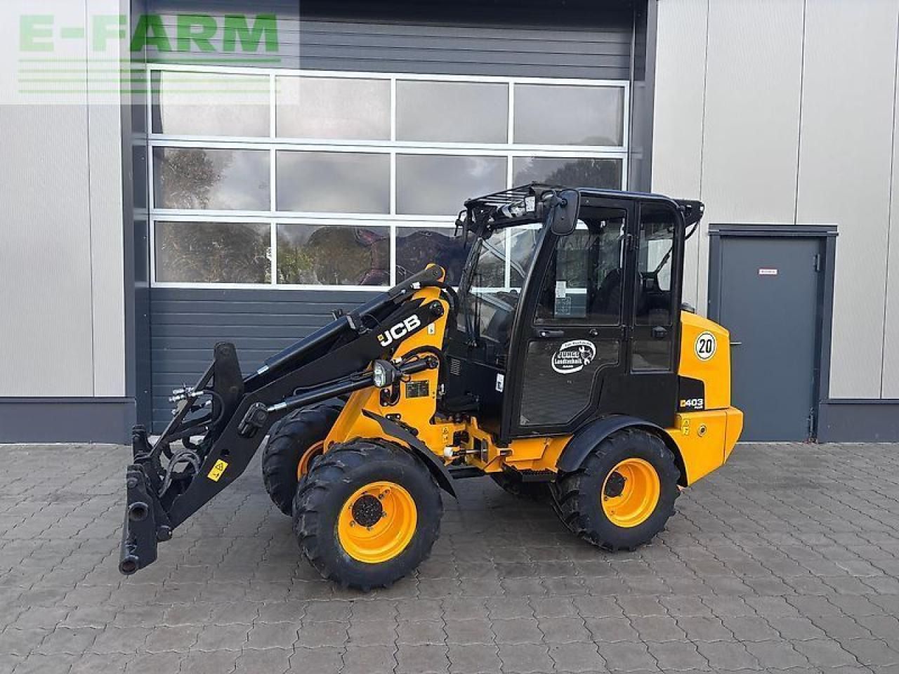 2024 JCB 403PLUS wheel loader, side view 2024 JCB 403PLUS wheel loader, side view