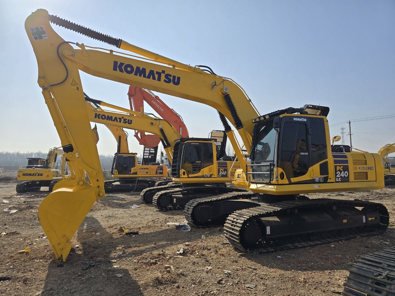 2025 Komatsu PC240-8 crawler excavator, side view