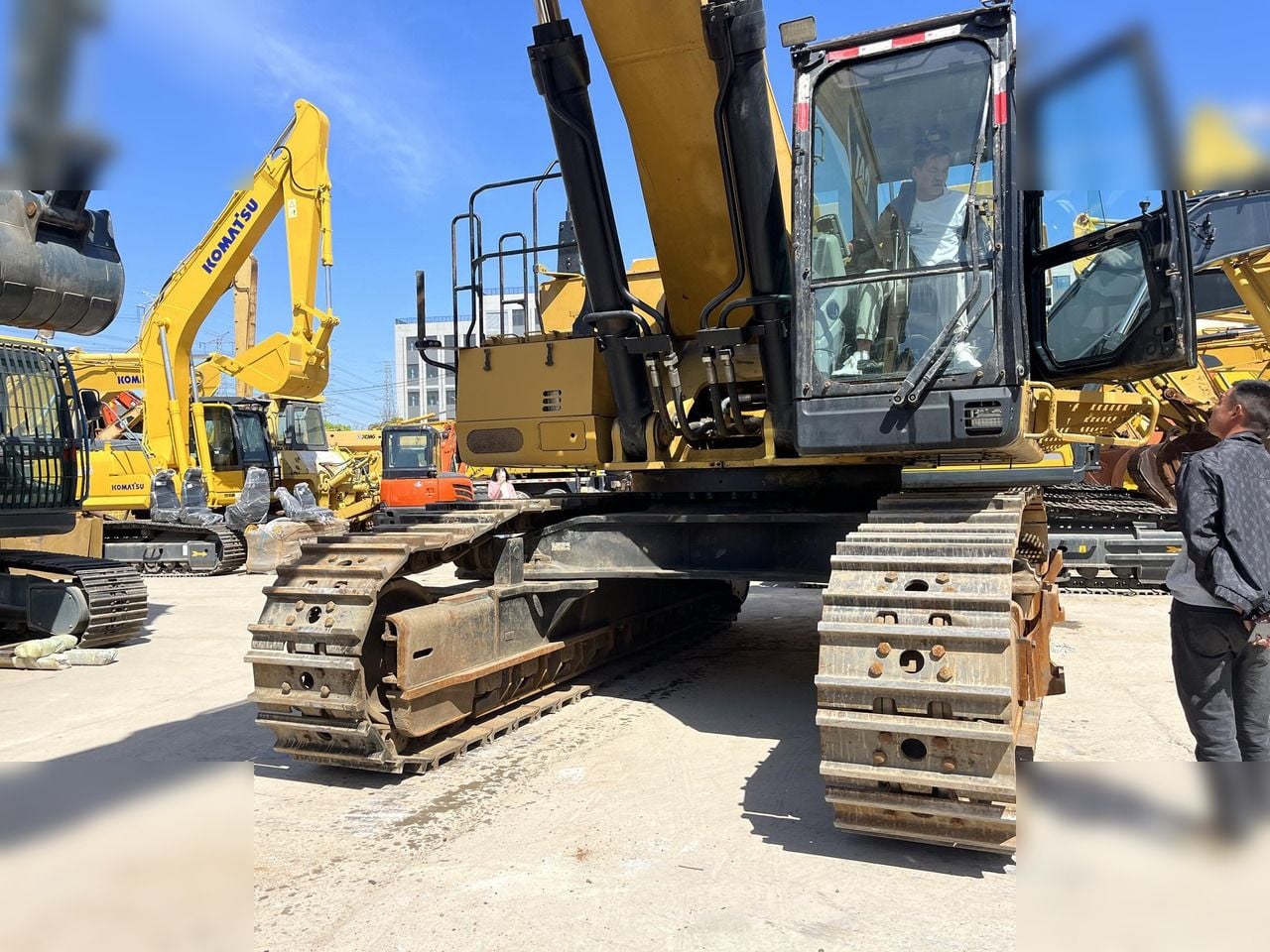 2017 Caterpillar 374FL crawler excavator, front three-quarter view