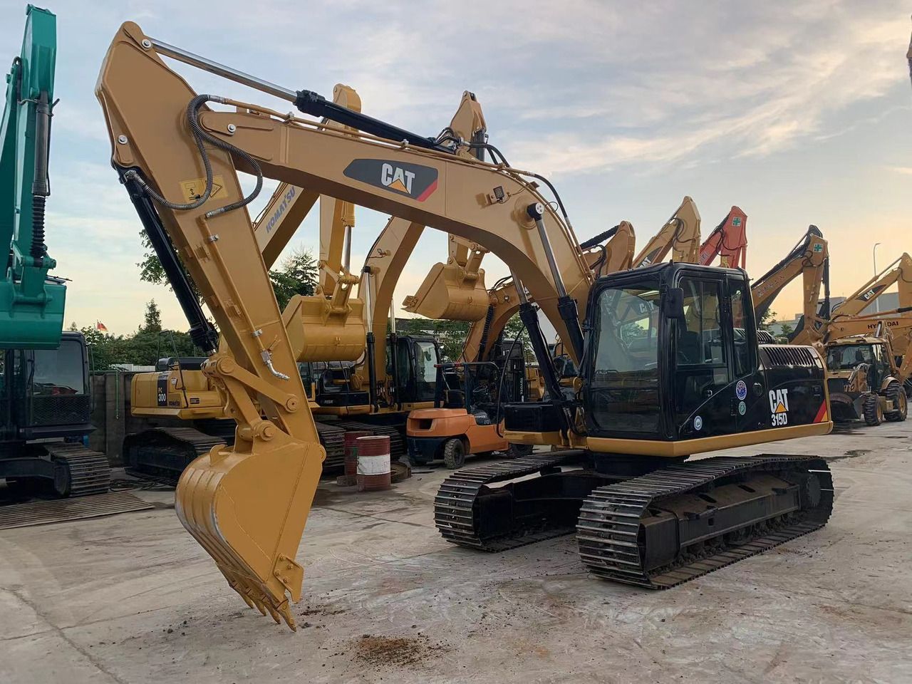 2023 Caterpillar 315D crawler excavator, front three-quarter view